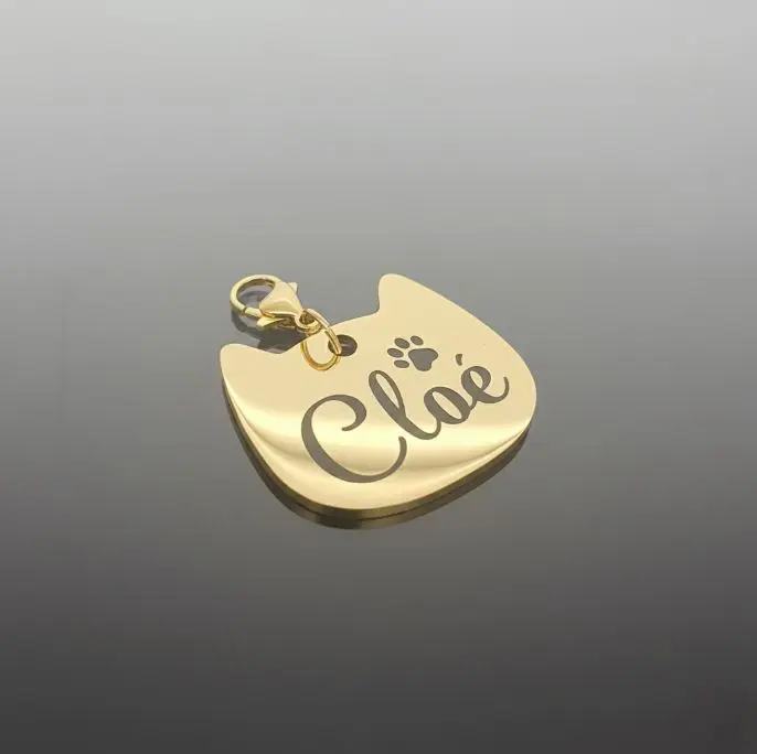 Dije mascota estilo Gato pulido espejo ac. Inox. Dorado grande 30x25mm