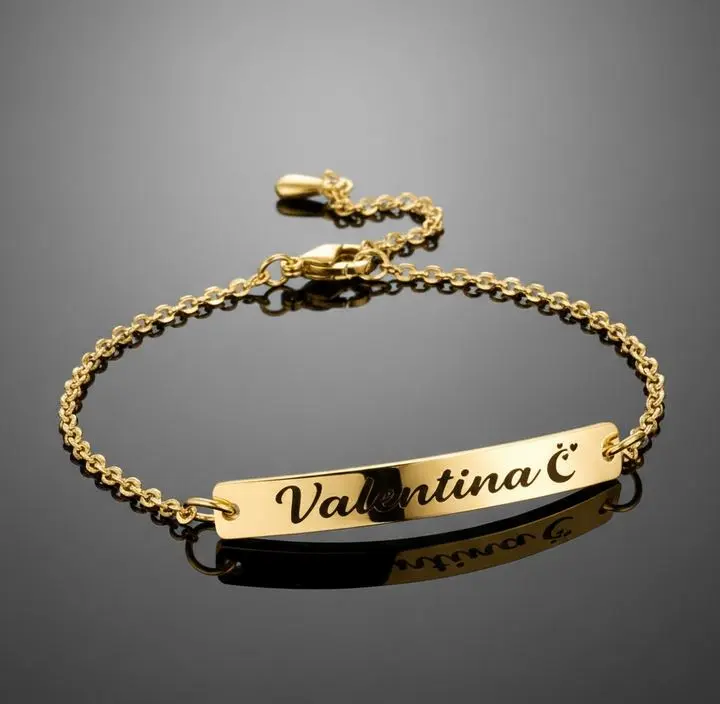 Pulsera dama de aros (estilo rolo) ac. Inox. 2mm c/placa rectangular plateada 5mm con cierre langosta.