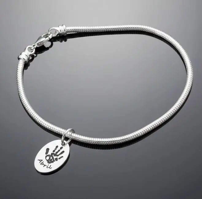 Pulsera Estilo Europea (3mm snake) cerrada Plata 9.25 con encantos