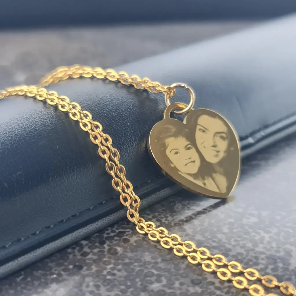 [X-CAAX-024DR-01] Cadena con Dije Corazon Tiffany pulido espejo ac. Inox mediano 25mm (Dorado)