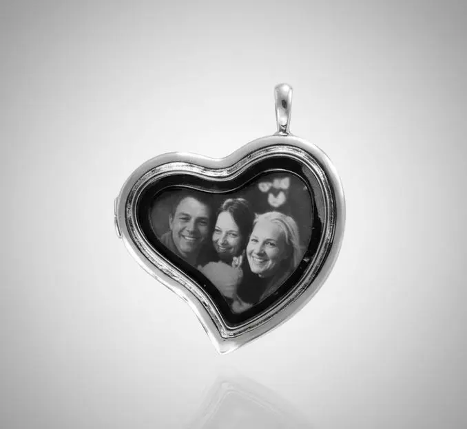 [X-REAX-004PT] Cadena con Relicario ac. Inox. corazon caido grande con vidrio plateado 30mm