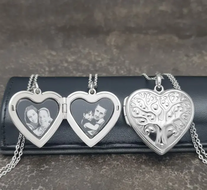 [X-REAX-017PT-01] Cadena con Relicario ac. Inox. corazón con diseño estampado árbol grande plateado 28mm.