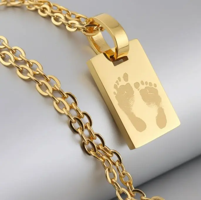 [X-CAAX-048DR-01] Cadena con Dije mini rectangular pulido espejo ac. Inox 10x15mm (Dorado)